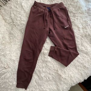 Woman’s Nike joggers.